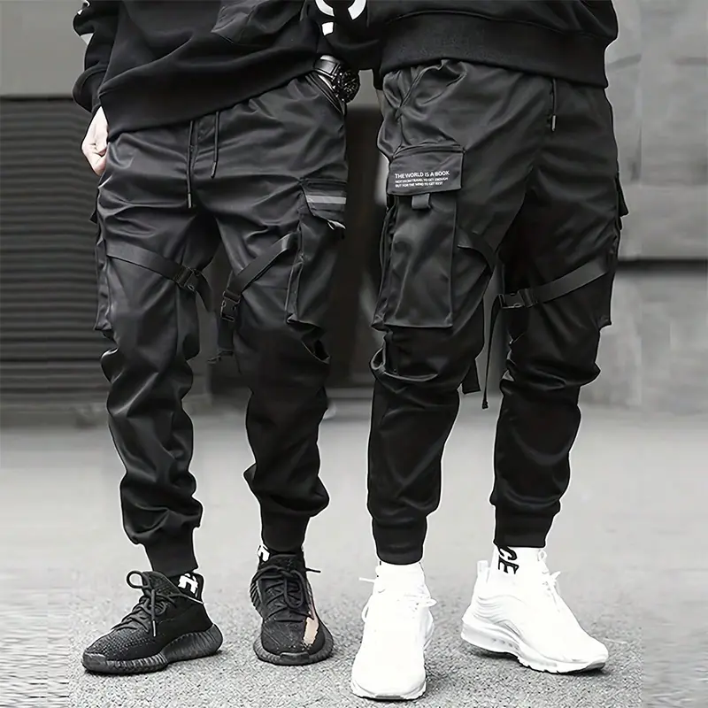 Men's solid color tactical work pants with durable multi pocket drawstring design, outdoor training pants, hiking and mountaineering