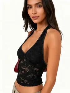 A women's black lace camisole, Sleeveless Halter Neck backless V-neck cropped bodycon top, sexy and fashionable hot girl style, suitable for summer, daily outings, vacations, and other occasions.
