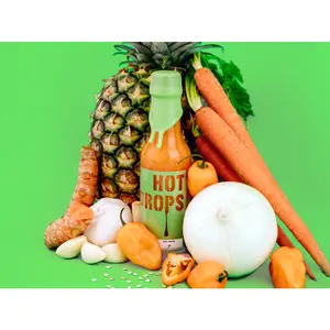 Tropical Thunder: Sweet heat from aged habanero, pineapple, garlic & charred turmeric carrots. A vacation in a bottle. Heat: 7/10