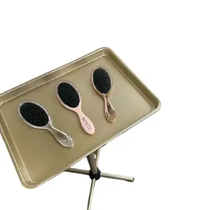 The BeautyBabeBrush is made with metal flexible bristle to allow for detangling. The are great for everyday use and perfect for a Hair Stylist.