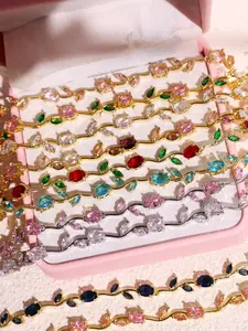 A delicate, fashionable bracelet featuring colorful rhinestones and tulip flowers; a refined women’s gemstone piece suitable for everyday stacking and as a party or wedding gift.