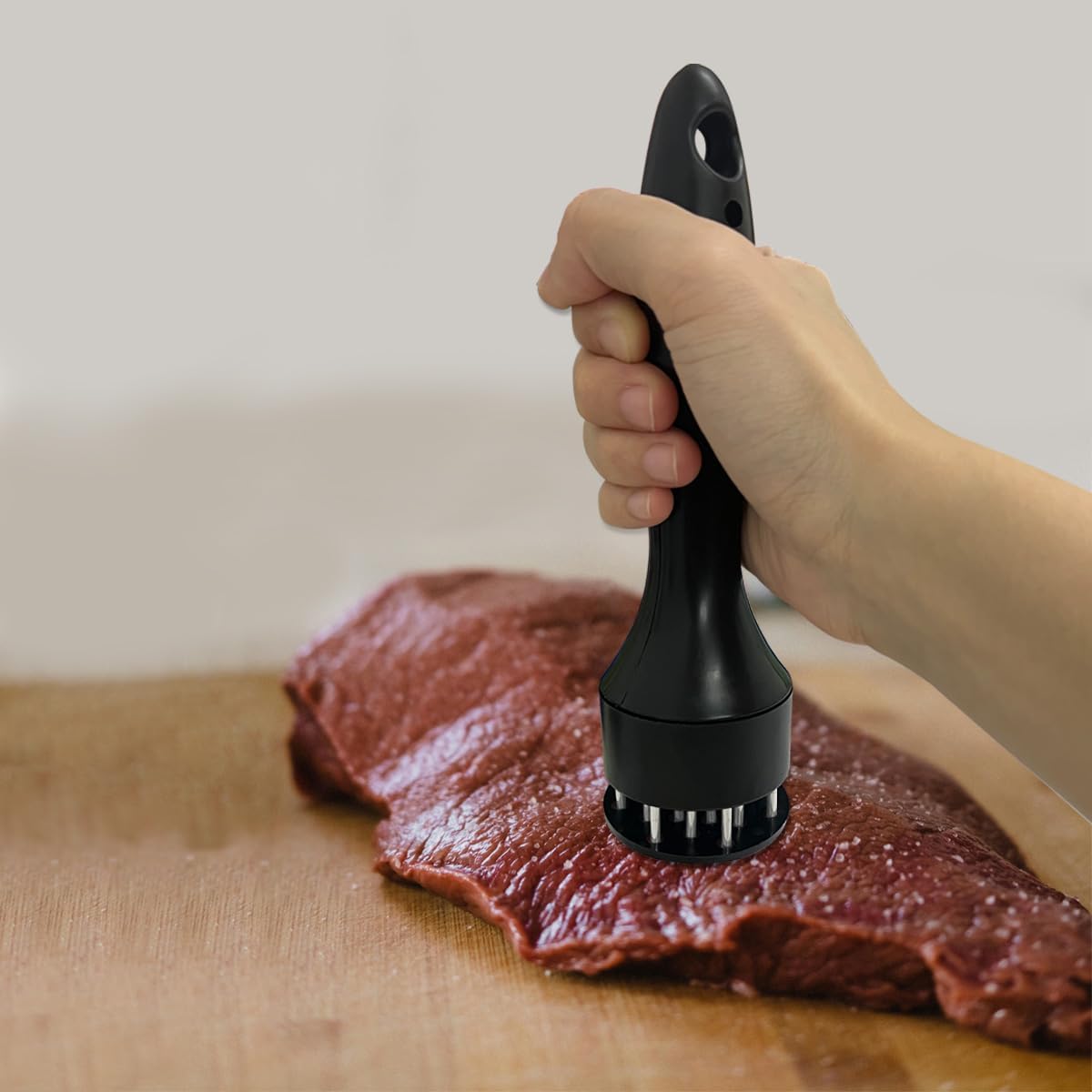 A stainless steel meat tenderizer, a heavy-duty meat needle tool suitable for steak, chicken, and poultry, perfect for grilling, grilling, and quick marinating