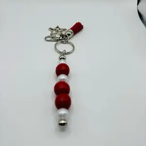 Red Beaded Keychain with Red Beads and White Pearls and a Tassel Charm