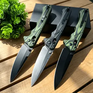 1401 EDC textured G10 handle folding knife with quick-opening and locking button, a must-have for outdoor travel and camping.