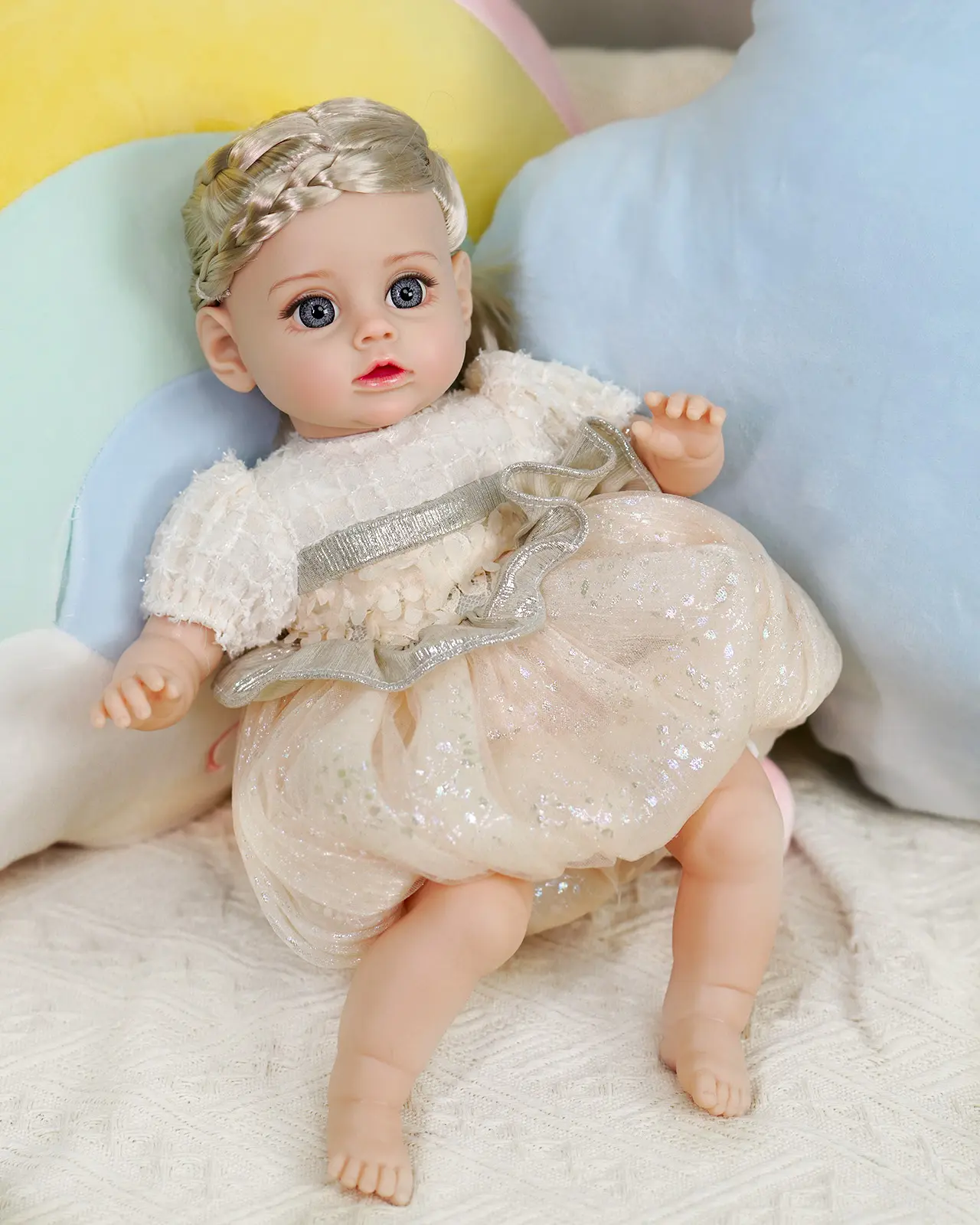 VACOS 14inch Handmade Reborn Baby Doll: Gift Package, Golden braided hair, vivid blue eyes, soft cotton body. Adorned in delicate white lace top with sparkling silver skirt, detailed body creases add lifelike charm. Perfect as a birthday or festival gift!