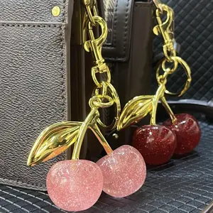 Cherry keychain charm for bags and wallets, cute women's keychains - leather handbag and car key decorations, very adorable.