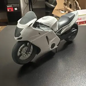 Custom Miniature Motorcycle Model Replica Detailed Scale Model for Collectors and Enthusiasts 3D-Printed High-Quality Materials Perfect for Display Gifting or Celebrating Your Ride