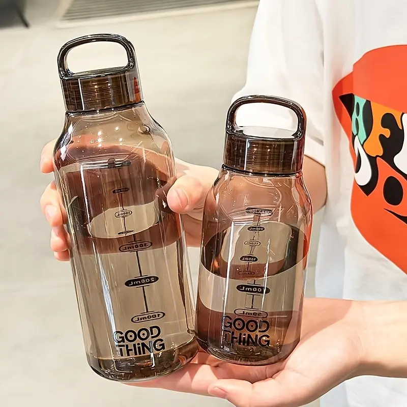 Japanese-style minimalist transparent polycarbonate water bottle—leak-proof, heat-resistant, and portable. Ideal for school, home, the office, and outdoor use, it’s easy to carry, durable, and stylish, making it perfect for everyday use.