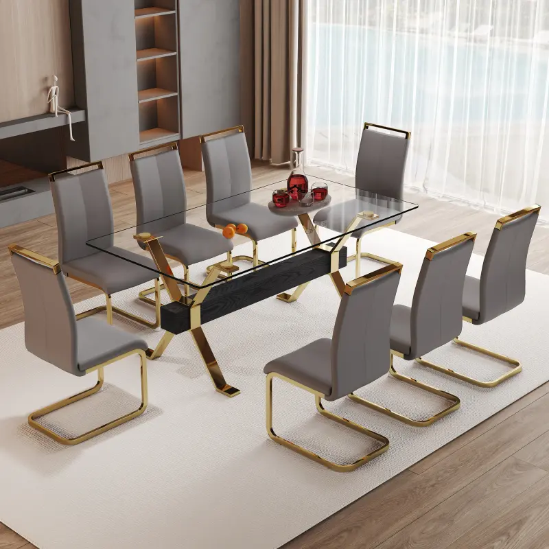 Table and chair set.Elegant Transparent Tempered Glass Dining Set - 71"x35.4" with 8 Dark Gray PU Chairs with golden C-tube metal leg.X-shaped Golden Metal Table Legs,Black Textured MDF Crossbeam.