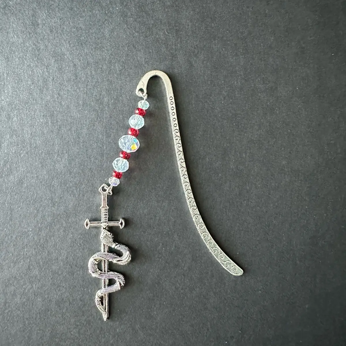 Snake and sword metal hook bookmark (red beads)
