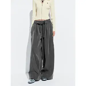 URBAN REVIVO 2026 Spring Women's Amber Glossy Washed Elastic Waist Tie Wide Leg Pants Drawstring Pull On Wide Leg Pants WomensWear UWJ650068