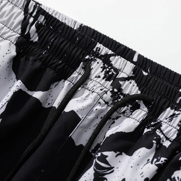 Artistic ink printing casual pants men's loose hanging high street pants black and white graffiti trend straight pants