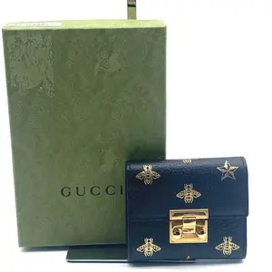 Pre-owned GUCCI leather Small Leather Goods Bee Star Padlock