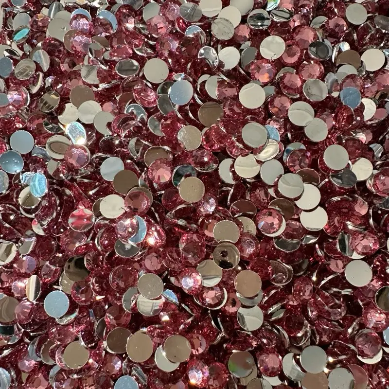 Non-fix resin flat back-silver bottom rhinestones-5mm- 3.000pcs- 58 grams. 4mm 5,000 pcs- 50grams. Nail art crafts decoration