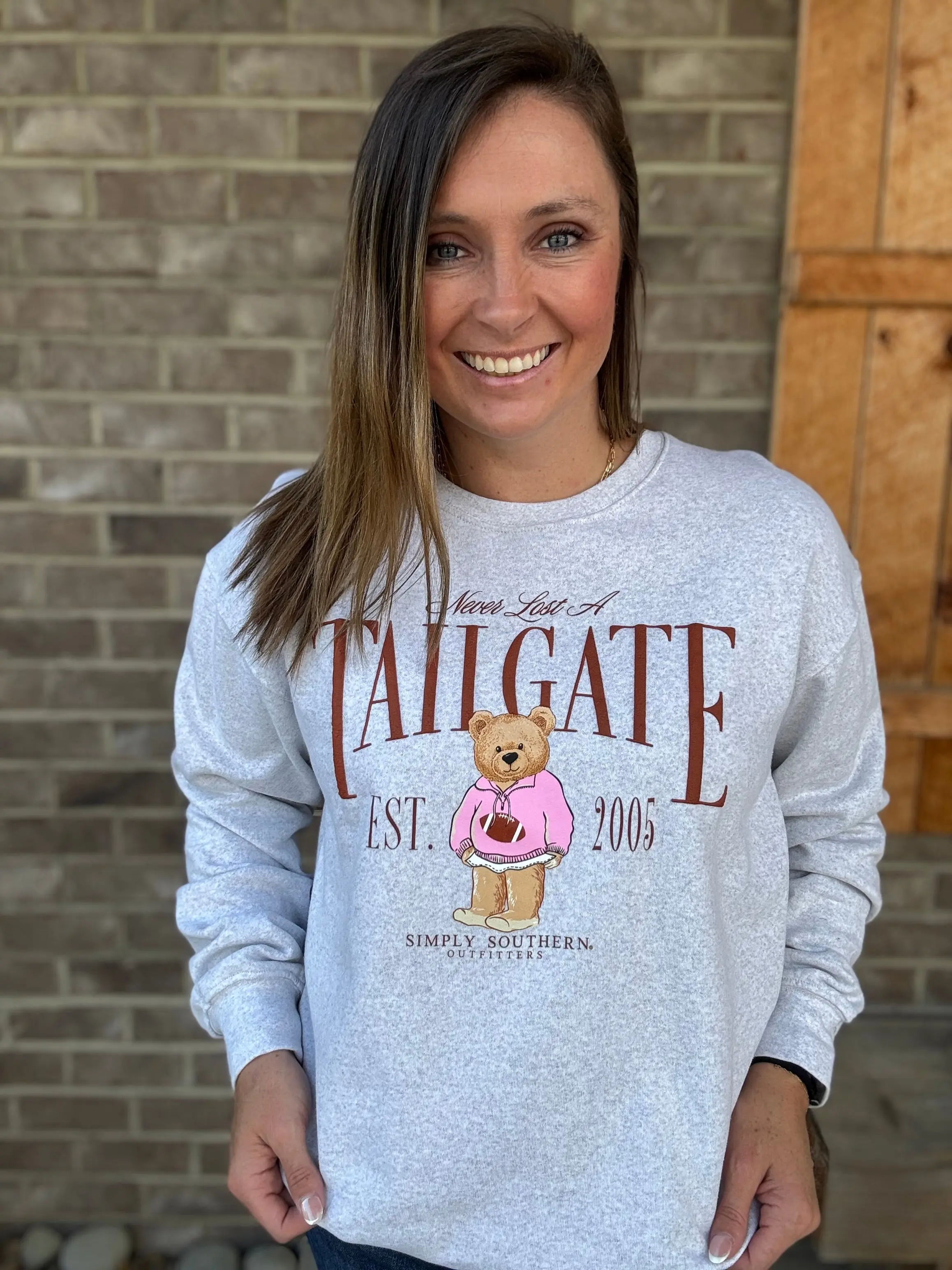 Never Lost a Tailgate Crewneck Pullover by Simply Southern