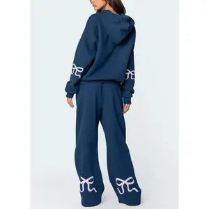 Spring 2025 new women’s fashion brand: long-sleeve hoodie with bow, matching pants, baggy fabric, casual polyester set; can be paired with a raincoat