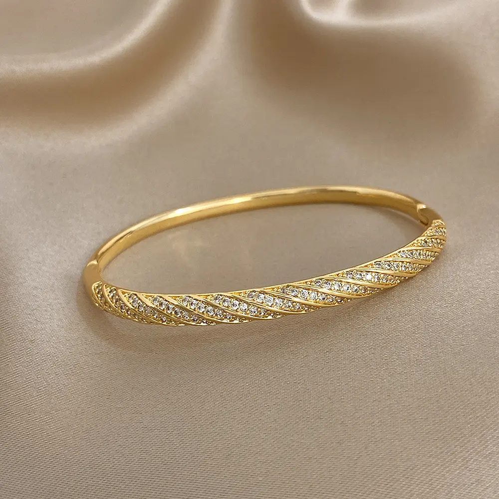Hotoo Women's Gold-Tone Copper-Plated Spiral Pave Crystal Hinged Bangle - Golden Aesthetic, Continuous Swirl, Twisted Shape, Flowing Twist Band, Casual Wear Statement Costume Jewelry, Layered Stackable Accessory
