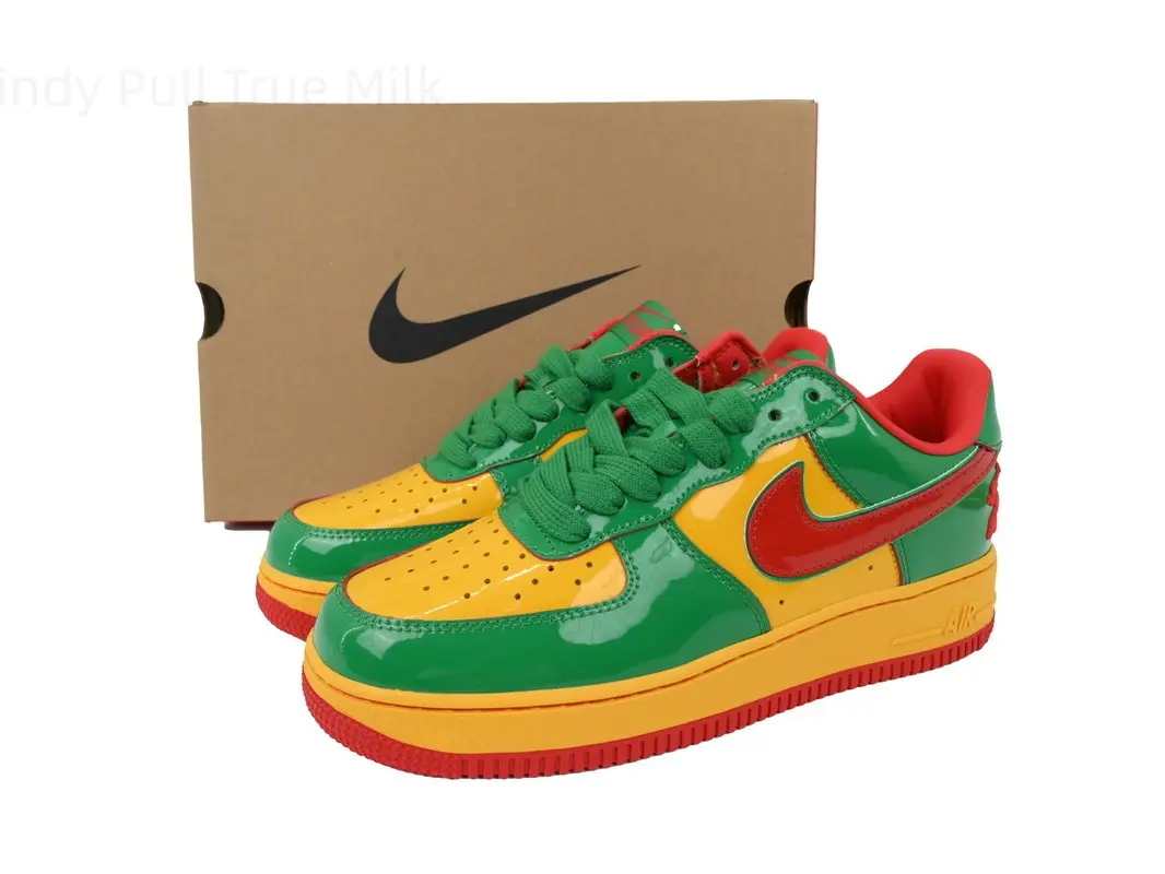 Bold tri-color glossy patent leather low top skate sneakers, striking green yellow red color-block design, matching layered red rubber outsole, unisex vivid trainers perfectly match old-school hip-hop, rap stage and underground street party outfits