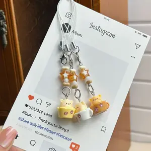 2026 New Cartoon Coffee Cup Butter Bear Phone Chain, paired with lovely brown star pendant. Sweet girly style design, versatile as backpack and bag charm, trendy delicate daily accessories for girls.