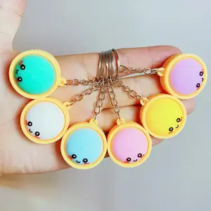 Light-Up Cute Dumpling Pressable Fidget Keychain - PVC Food‑Shaped Charm, Wear‑Resistant Stress Relief Toy for Daily Use, Party & Gifting