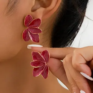 A pair of elegant retro style maple leaf and floral earrings for ladies - perfect for parties and vacations with multiple colors to choose from