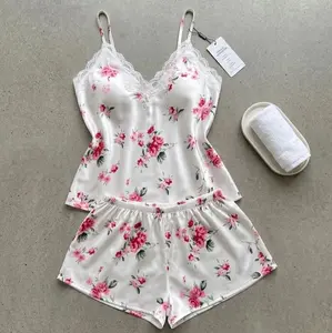 Elegant Floral Lace Pajama Set with Delicate Pink Roses and Soft White Fabric for Comfort