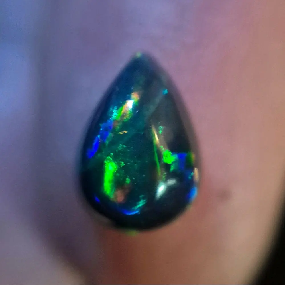 1.5 carat Smoked Black Ethiopian Welo Opal Teardrop Cabachon