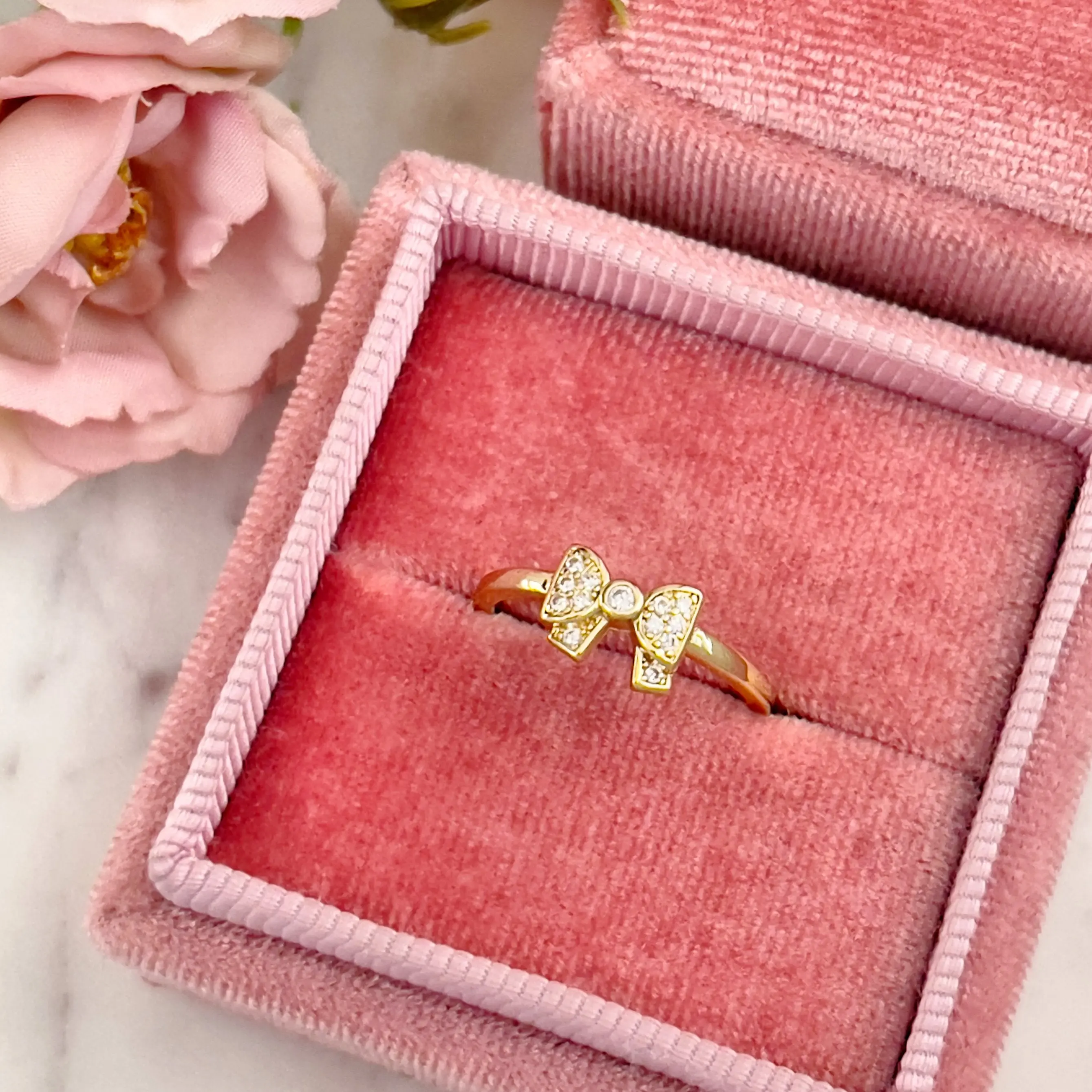 Elegant Sparkling Bow Ring in Gold-Plated Brass with Cubic Zirconia, Size Adjust Design for Unisex Wear