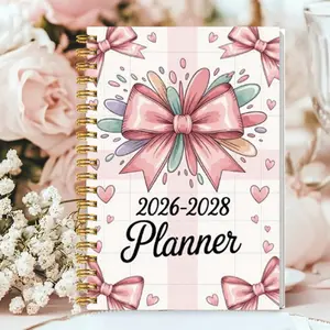 The three-year plan for 2026-2028 (the plan for 2026-2028) has a pink cover with bows and love patterns, including monthly calendar, target tracking, holiday list and to-do list. The long cover is suitable for long-term planning Spiral Bound Planner