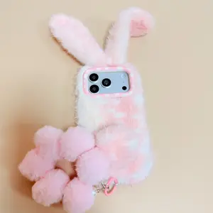 For iPhone14/15/16/17 Long-Eared Rabbit Plush Ball Charm Phone Case | Soft Plush + 3D Rabbit Ears + Full Protection | Cute & Portable | Girlish Sweet Cool Style for Daily Outings/Commutes