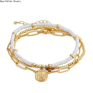 Multi-Layer Gold Bead & Heart Charm Bracelet — Fine-Bead, Multi-Strand Braided Cord, Adjustable — Women's Stackable Accessory for Daily Wear & Commuting