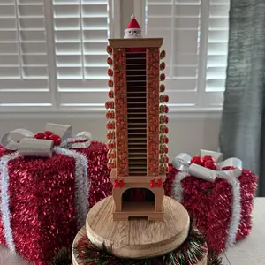 Christmas Santa Chimney Countdown Advent Calendar with Festive Red and Gold Accents for Holiday Season