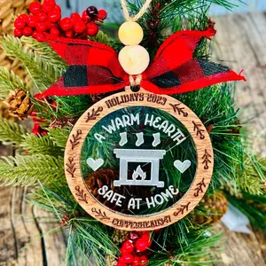 Wood and acrylic A Warm Hearth Safe At Home holiday ornament and cookie stamp