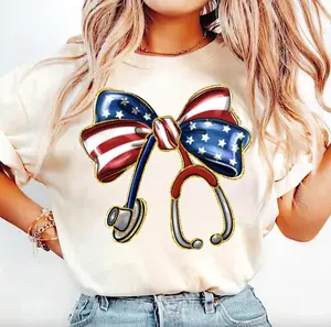 American Nurse Coquette T-Shirt, 4th of July Coquette Tee, America Shirt, Nurse Bow Ribbon Stethoscope American Flag Sweater, USA Nurse Gifts, For Her Casual Daily Wear Tee For Men & Women, Apparel Made In The USA