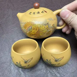 Traditional Chinese Handmade Teapot with Gold Painted Flying Dragon on External Surface Comes with Two Matching Tea Cups for Elegant Tea Brewing.H011