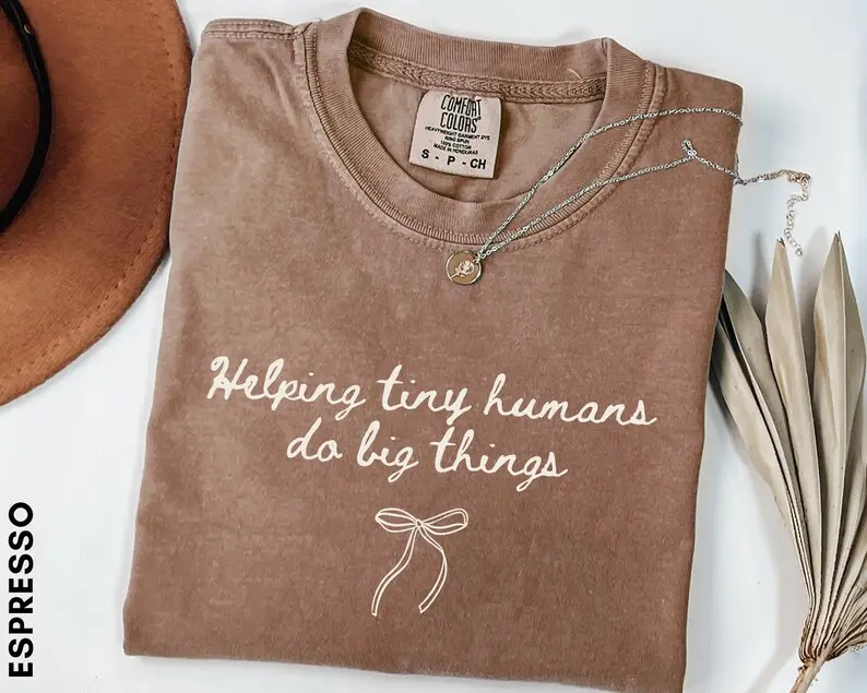 Comfort Colors Helping Tiny Humans Do Big Things T-Shirt, Gift for Teacher, Coquette Teacher Tee, Back To School Teacher Shirt, Kindergarten Teacher Shirt
