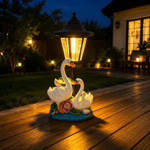 Single unit solar swan garden statue light, resin double swan LED lantern with warm lighting effect, weather-resistant outdoor decoration for courtyard, lawn, and pathways, suitable as a Mother’s Day gift for mom.