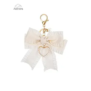 Women's Bowknot Keychain Charm, Bag Charms, Pearl Wrist Strap Backpack Pendant Accessory, Cute Handbag Wallet Pendant Jewelry Gift for Women