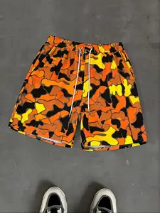 These stylish men's athletic shorts feature a trendy camouflage pattern, are easy to machine wash, and are perfect for various activities such as basketball and hiking. These versatile casual shorts are lightweight and breathable.