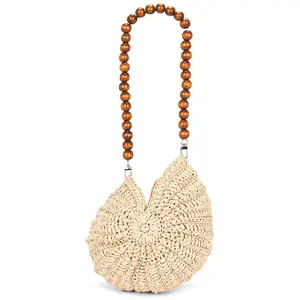petit moments Sirena Shell Bag in Beige