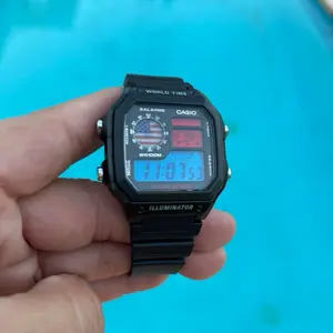 Casio AE-1200 World Time USA Flag Mod Illuminator Digital Watch with Original Strap 100M Water Resistant 5 Alarms Stopwatch Countdown Timer LED Light
