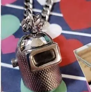 molded trim welding hood pendant and chain