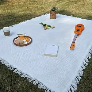 1pc Machine Washable Polyester Picnic Blanket - White Braided Outdoor Mat with Tassels, Moisture-Proof Ground Cover for Camping, Beach, and Sofa Throw, Perfect Dining Relaxation, Accessories