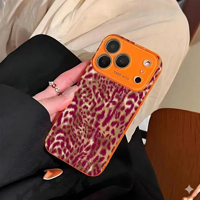 Burgundy plush leopard print phone case. Compatible with iPhone 17 Pro Max, 16 Pro Max, 15 Pro Max, and 14 Pro. Includes lens protection. Also suitable for iPhone 15, 14, 13, and 12. Made of skin-friendly TPU material. A great birthday gift.