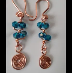 Handcrafted Wire Wrap Earrings with Dark Blue Beads and Copper Dangle Features Unique Spiral Design for Stylish Accessory