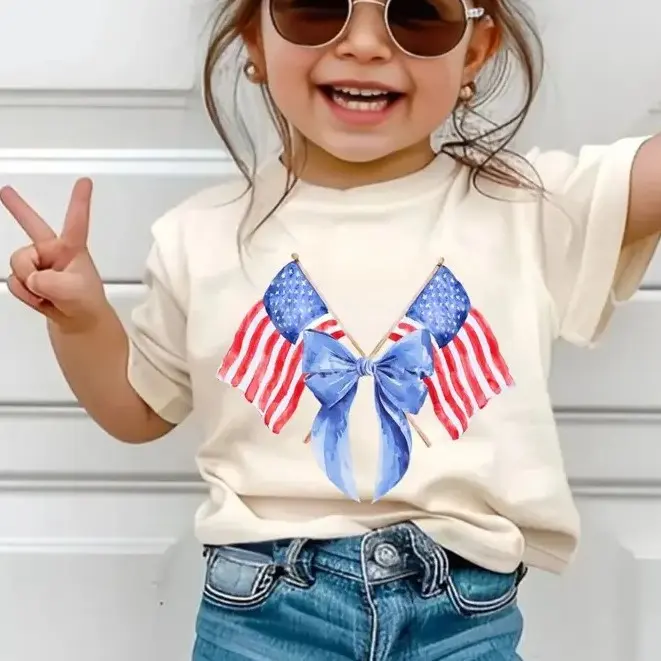 America Flags And Bows Youth T-Shirt – Coquette 4th of July Tee for Girls, Cute Country Style Summer Shirt, Patriotic Independence Day Outfit for Boys and Girls