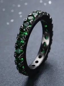 A creative and trendy synthetic zirconia black and golden emerald ring accessory is suitable for women