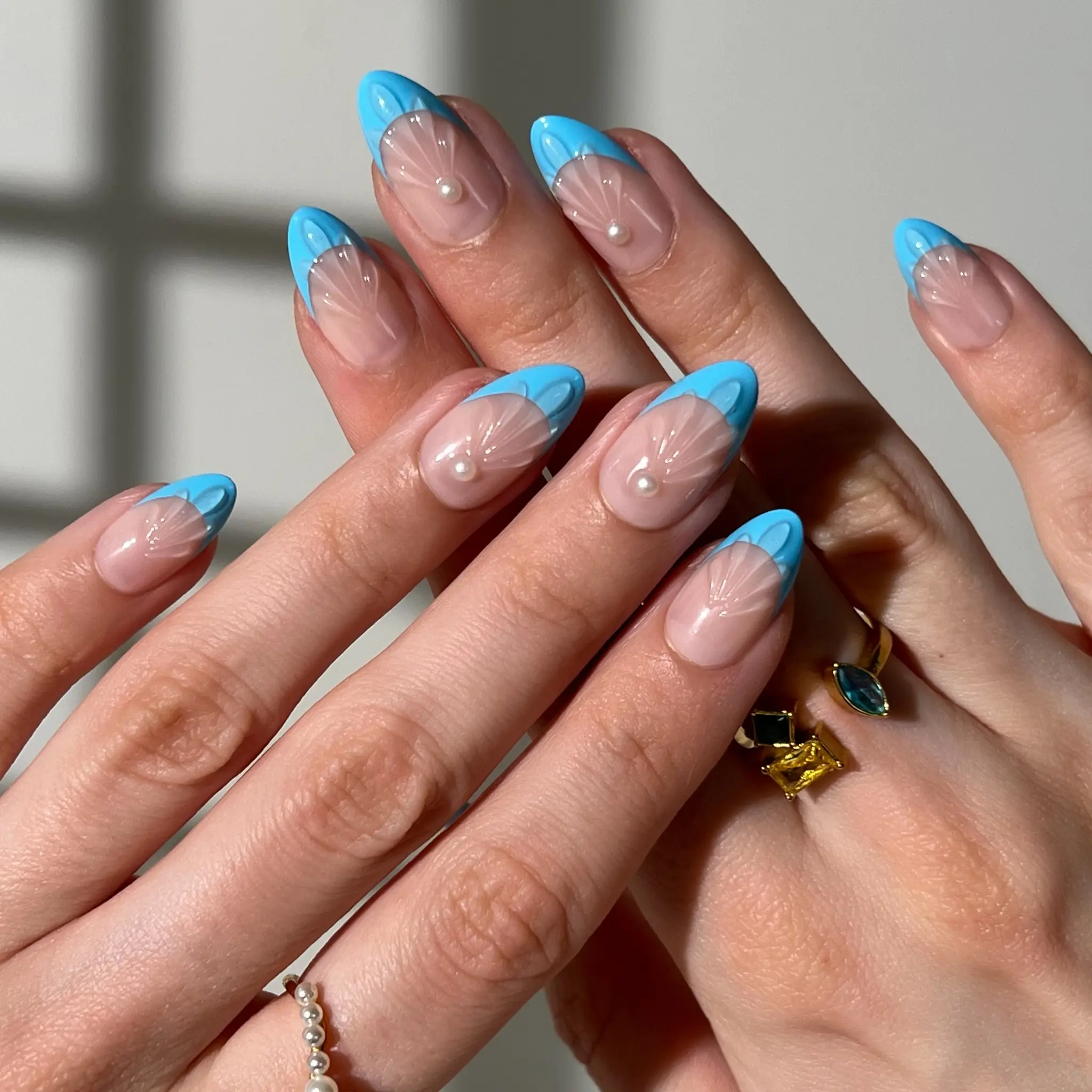 Glittering Mermaid Press-On Nails with Smooth Nude Base Crisp Ocean-Blue French Tips & Subtle Seashell Texture for Mermaid Lovers