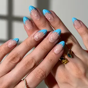 Glittering Mermaid Press-On Nails with Smooth Nude Base Crisp Ocean-Blue French Tips & Subtle Seashell Texture for Mermaid Lovers