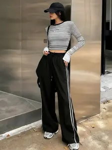 A women's wide-leg, elastic drawstring waist, white stripes on the side, Casual street style ladies trousers, Casual comfy fit, suitable for autumn and winter, creating street, sports trendy shapes